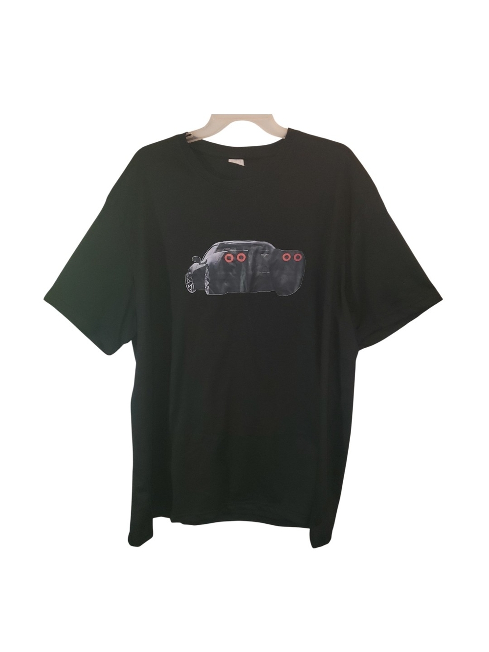 Black XXXL graphic tee displaying a rear-view design of a Chevrolet Corvette C6.